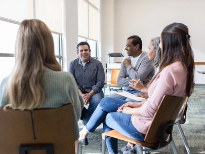 A diverse group of community members discuss Stop HIV Iowa strategic planning